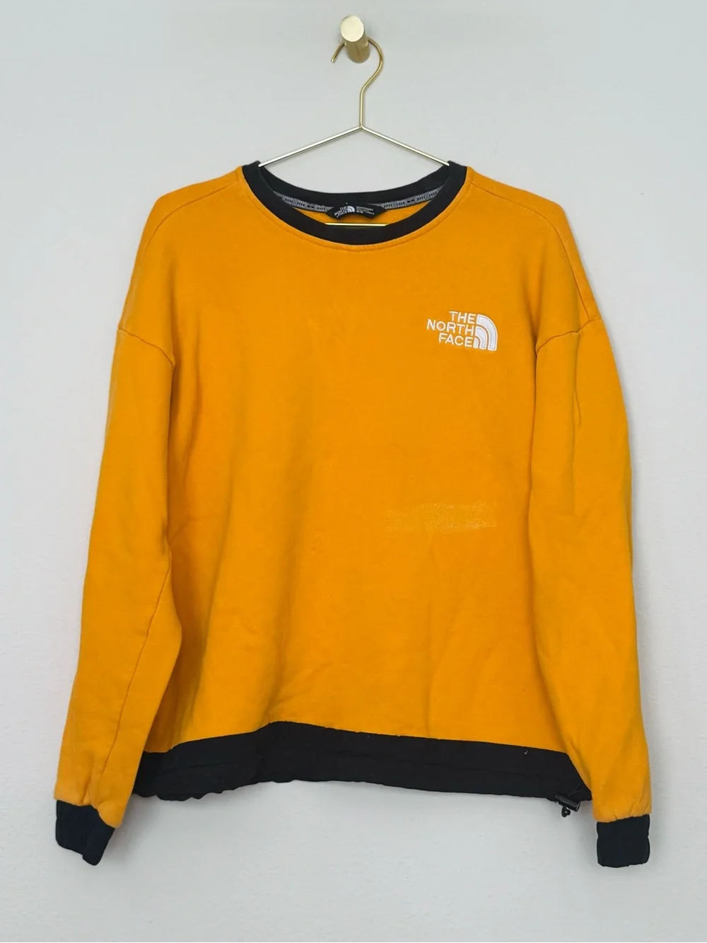 The North Face Men’s Orange Crewneck with Black Trim